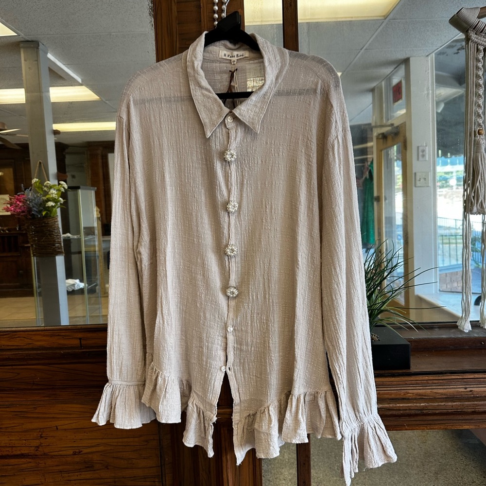A Rare Bird Cream Textured Blouse with Pearl Button Covers That Can Be Removed
